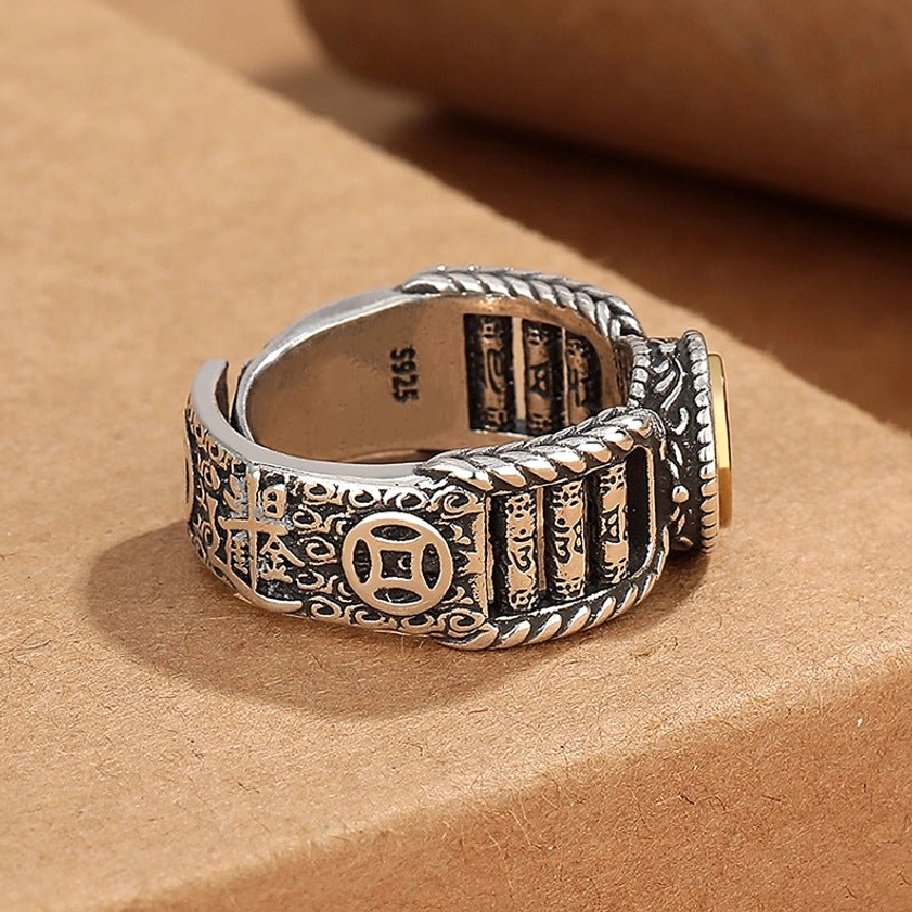 Open band Om Mani Padme Hum ring side view showing inner stamp and carved mantra detail
