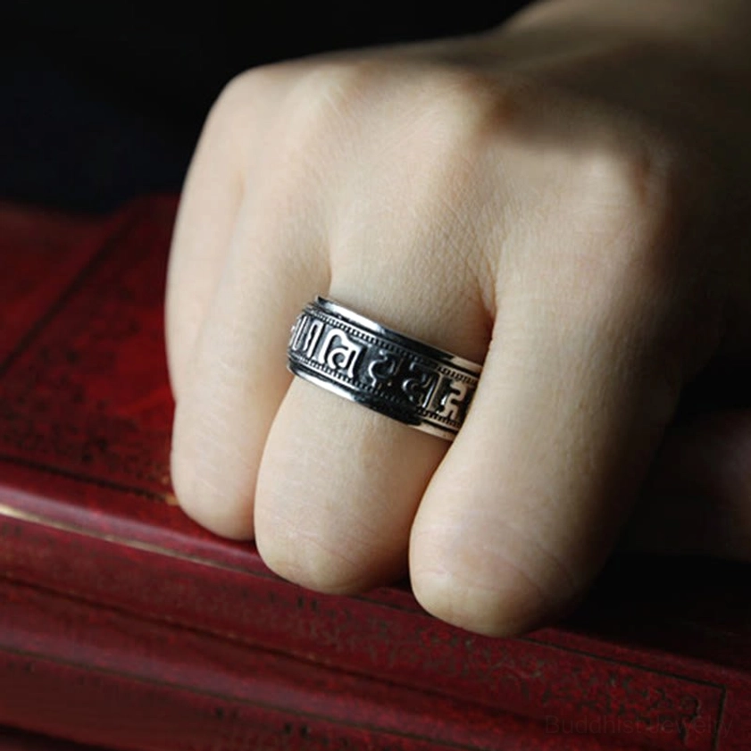 Om Mani Padme Hum spinner ring in multiple sizes showing versatile sizing options