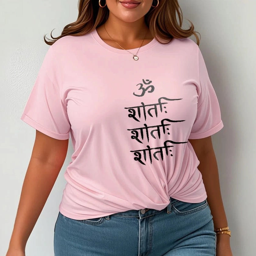 Female model wearing light cyan OM mantra Buddhist spiritual t-shirt with white print, comfortable unisex silhouette