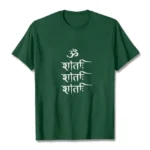 Flat lay front view of dark green OM mantra Buddhist t-shirt with white Sanskrit print on plain studio background