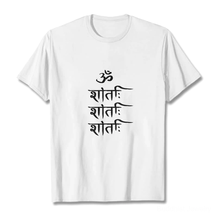 Flat lay front view of white OM mantra Buddhist t-shirt with black Sanskrit symbol print on plain studio background