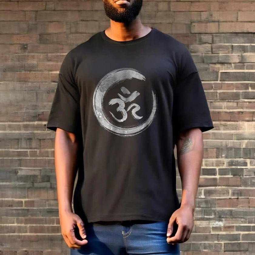 Unisex OM mantra Buddhist tee with grey Sanskrit print, casual street style brick wall background