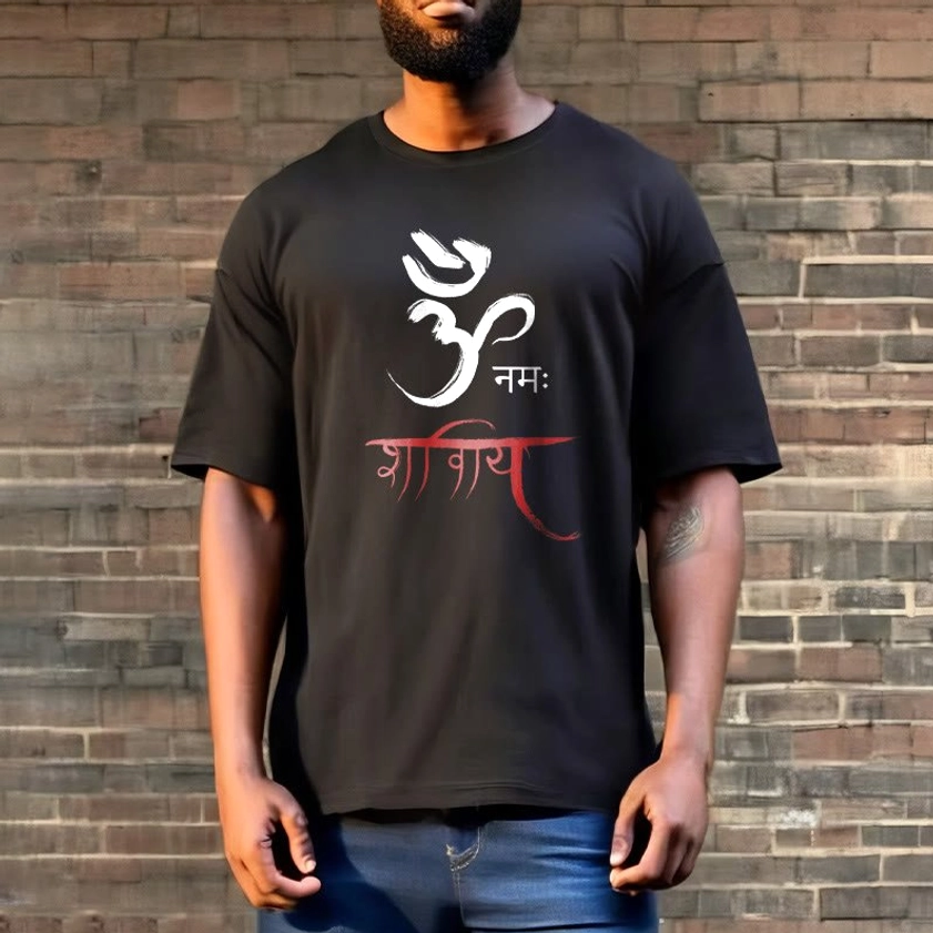 Male model in black Om Namah Shivaya mantra t-shirt against brick wall background