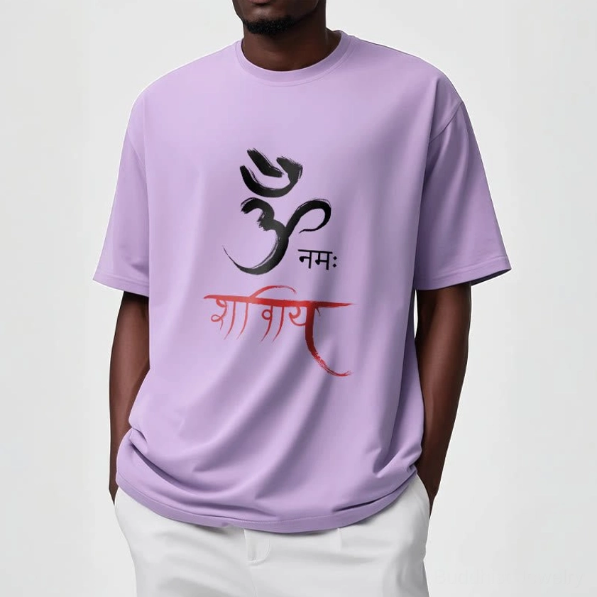 Man wearing pale green Om Namah Shivaya Buddhist spiritual tee, casual relaxed style