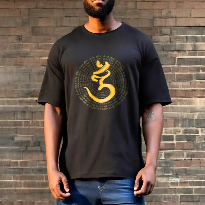 Black Om Namah Shivaya tee on male model outdoor brick wall casual streetwear look