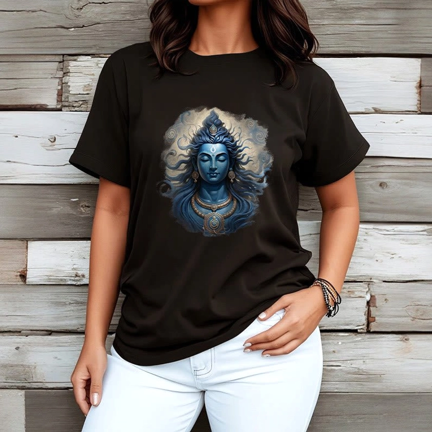 Sacred mantra graphic tee on female model wearing black shirt with blue deity print, model pose