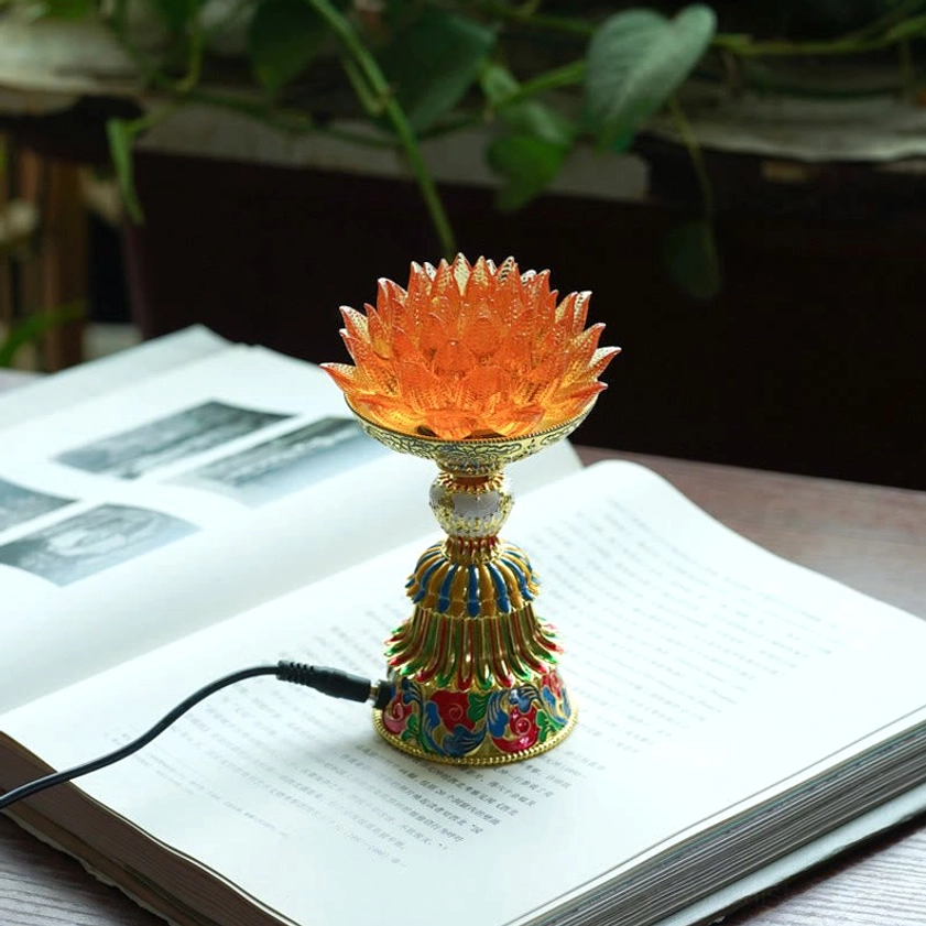 Orange liuli glass lotus lamp with detailed enamel base and charging cable connection