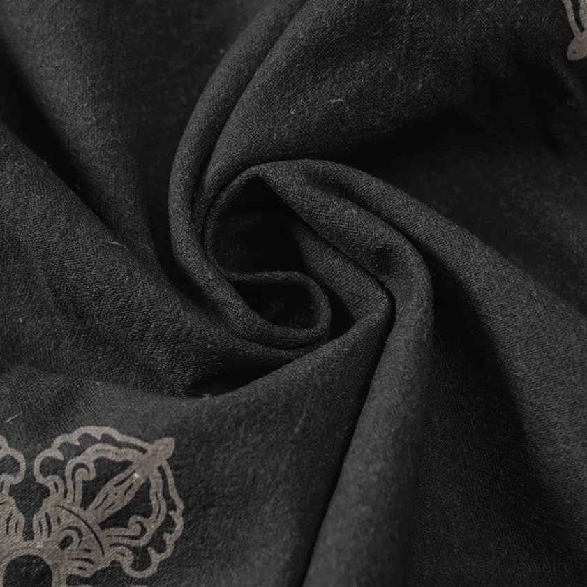 Draped organic cotton fabric showing lotus and vajra religious spiritual print design