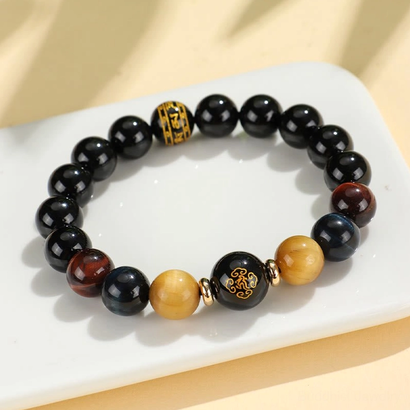 Ox and tiger zodiac natal Buddha variant with Void Bodhisattva black onyx tiger eye bracelet
