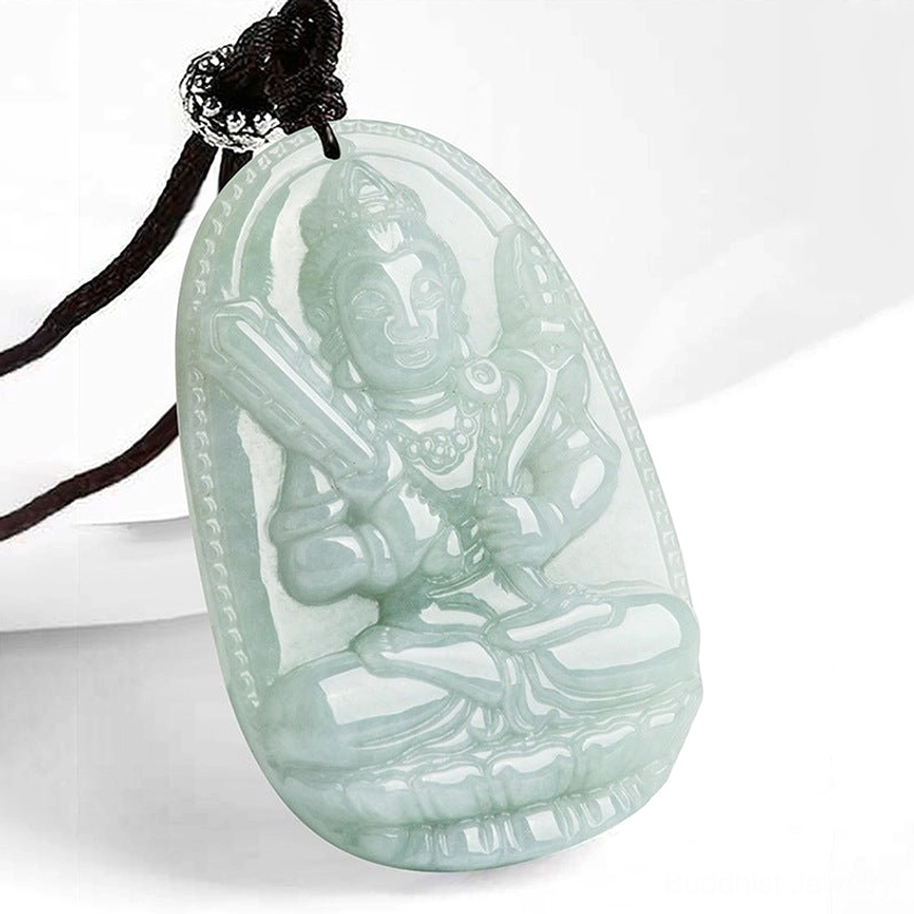 Ox Tiger zodiac Buddha jade pendant with embossed Buddhist figure detail on white background