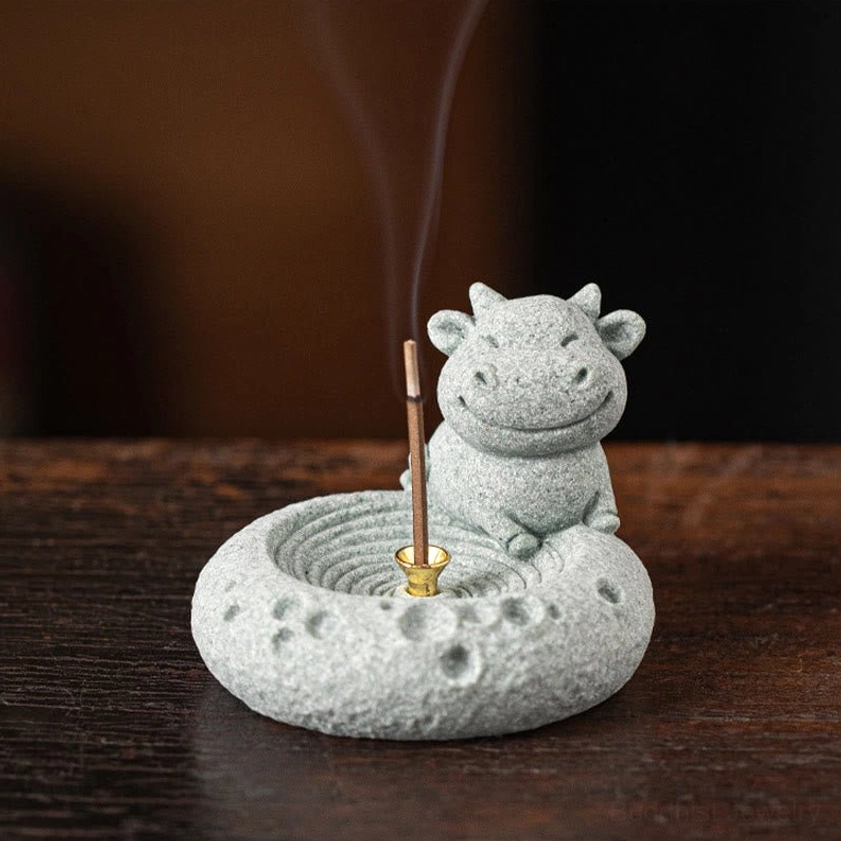 Ox zodiac incense burner side close-up burning incense stick detail