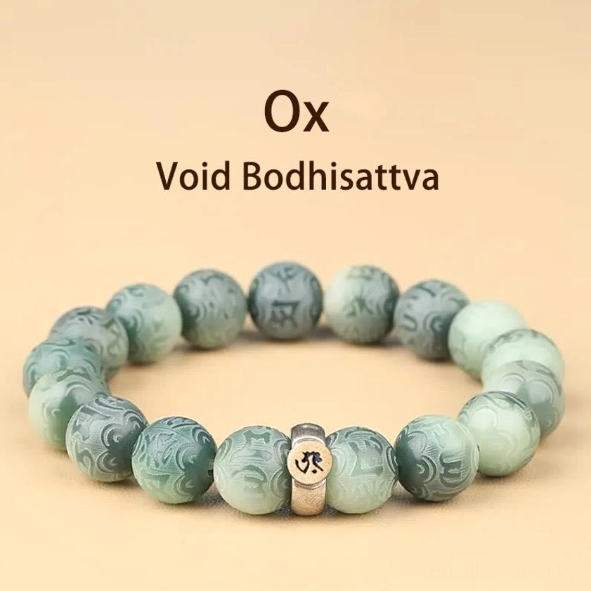 Ox zodiac natal Buddha bracelet with Akshobhya Buddha charm and engraved green bodhi beads