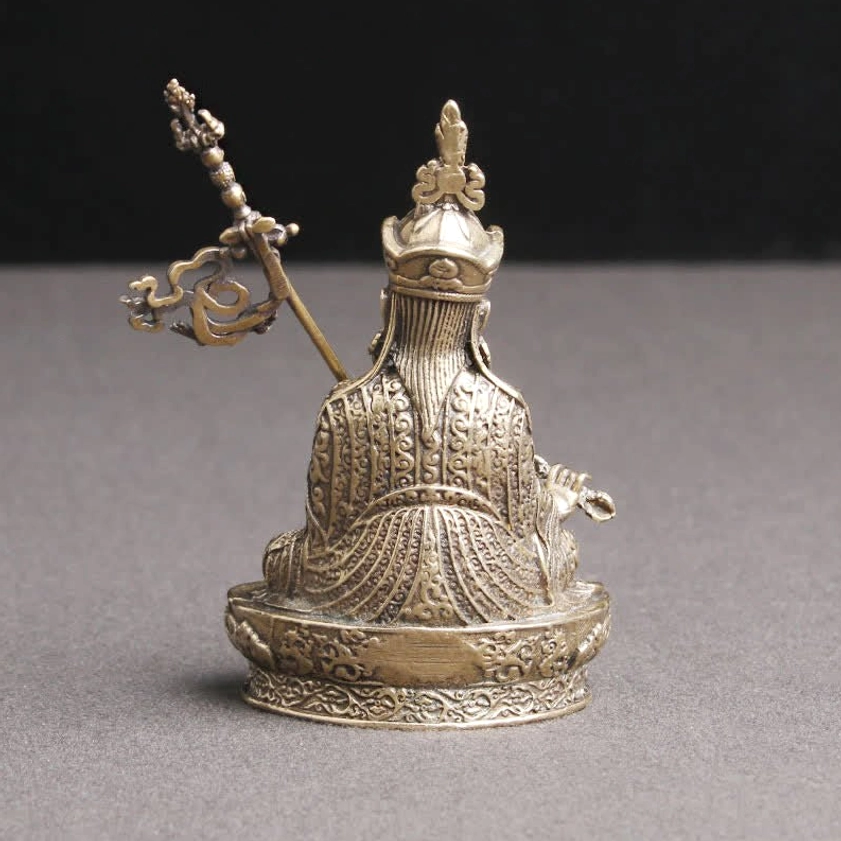 Padmasambhava Buddha statue rear back view showing carved back patterns and ornate headdress details