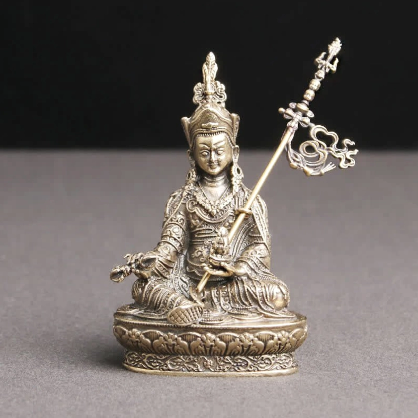 Padmasambhava Buddha statue front-right view with intact ceremonial staff and fully carved lotus base