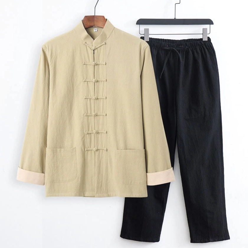 Pale goldenrod and black Tang suit two-piece set front view showing traditional frog button design