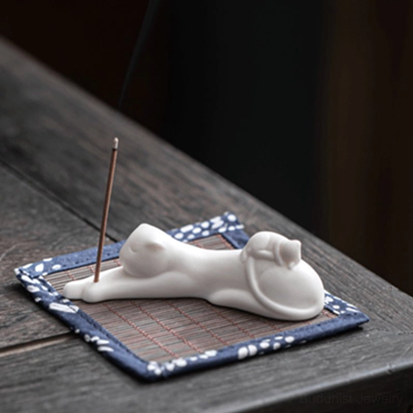 Panda ceramic incense burner handcrafted, gentle expression with gold collar, spiritual Buddhist meditation tool and home décor piece
