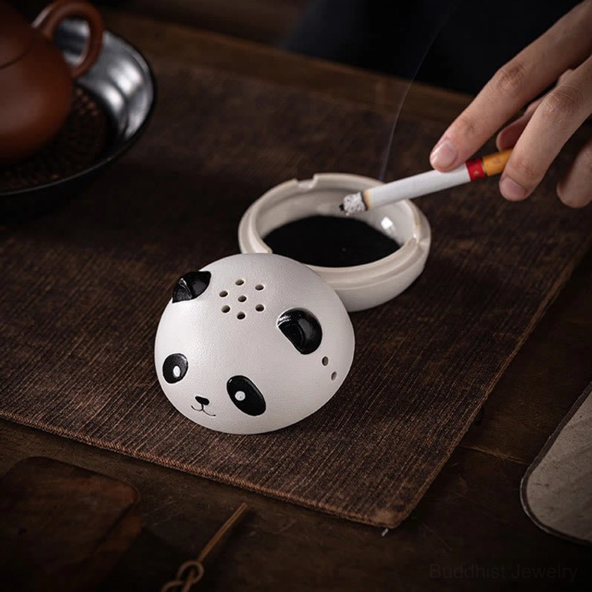 Panda-shaped ceramic incense burner in home meditation space, demonstrating functional use and decorative appeal