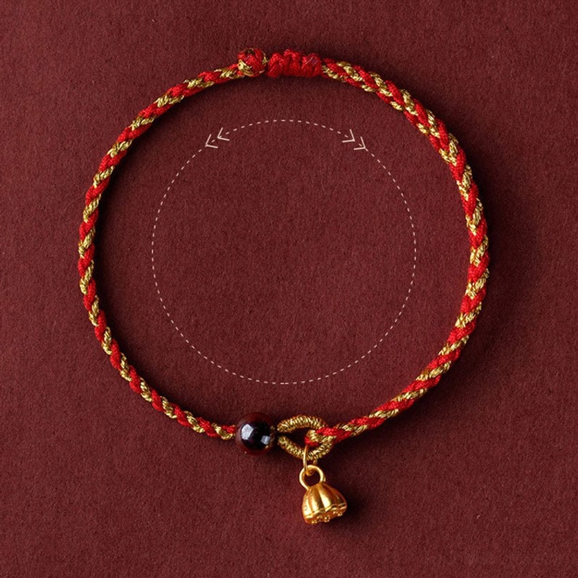 Peace and joy character charm red gold braided Buddhist protection bracelet close-up