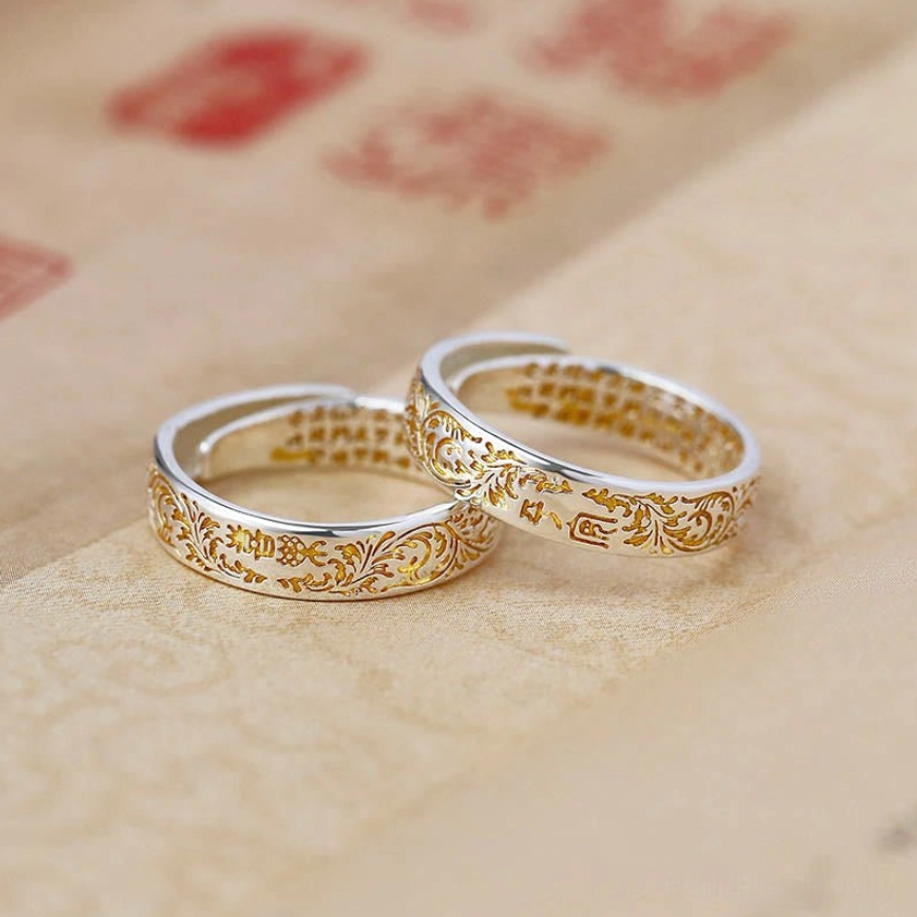 Matching pair of peace and joy adjustable Buddhist rings with Tang dynasty flower carvings and heart sutra engravings