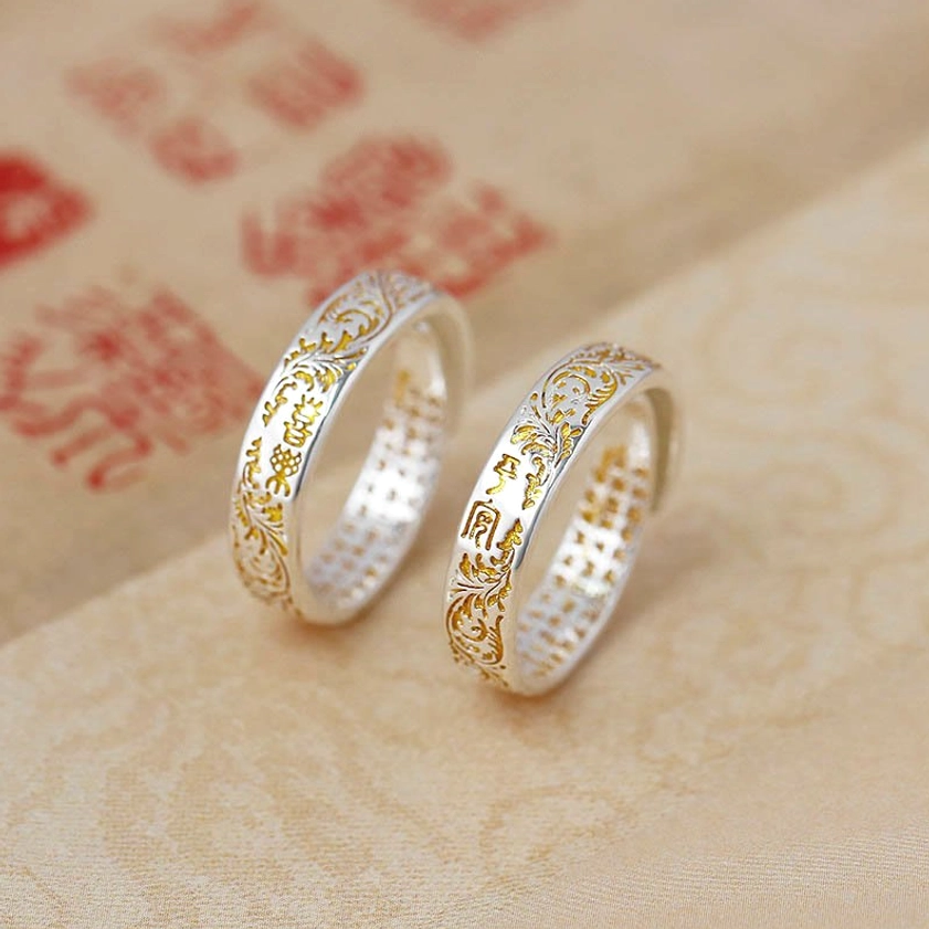 Pair of peace and joy adjustable lotus rings with Tang dynasty flower patterns and heart sutra carvings in two-tone copper finish