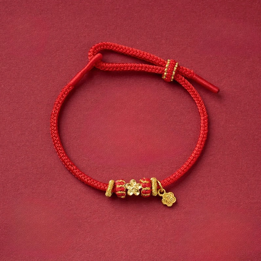 Peach blossom copper red string bracelet with beaded accents and protective charm