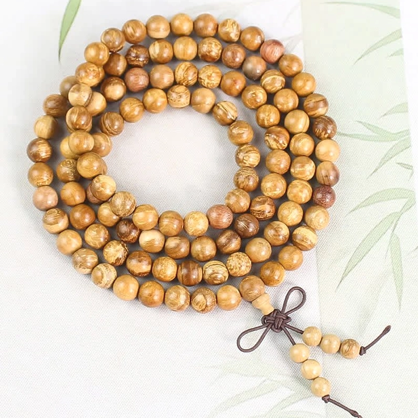 8mm old grain pattern peach wood prayer mala with butterfly knot design