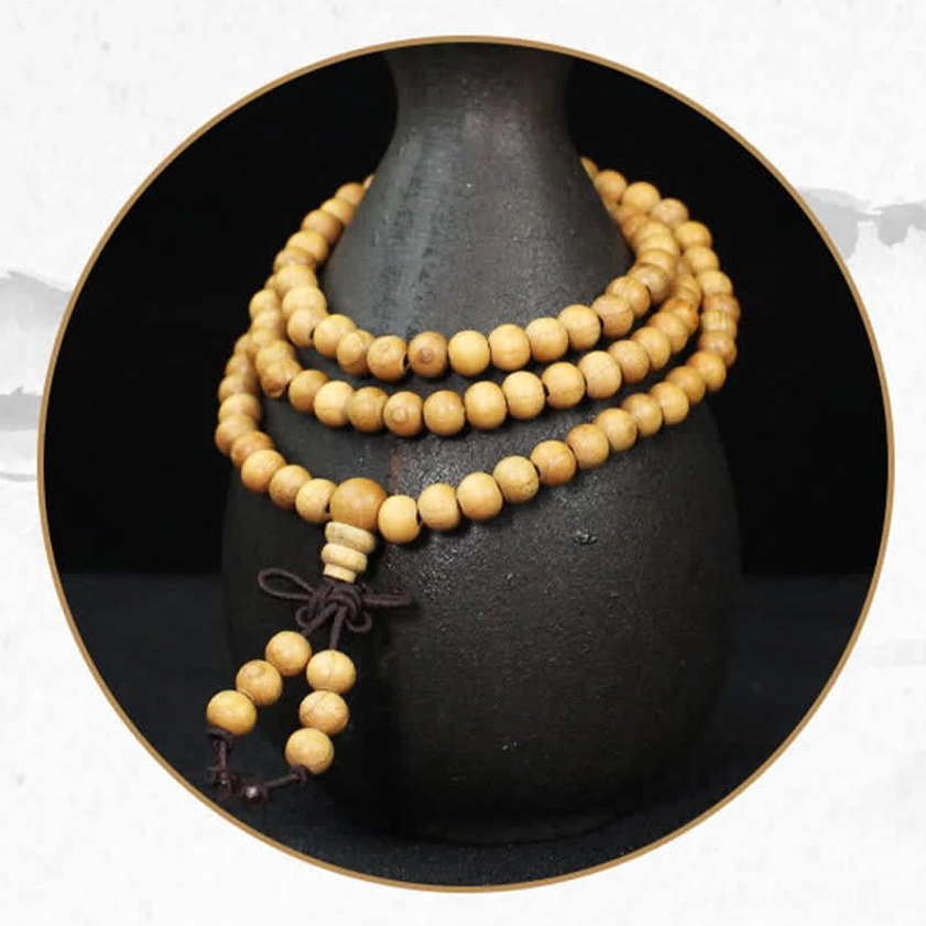 Peach wood 108 bead Buddhist prayer mala authentic handcrafted close-up
