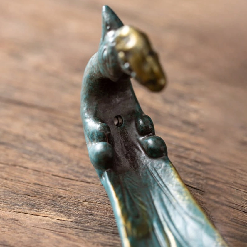Peacock head detail gilded metal ceramic body close-up craftsmanship