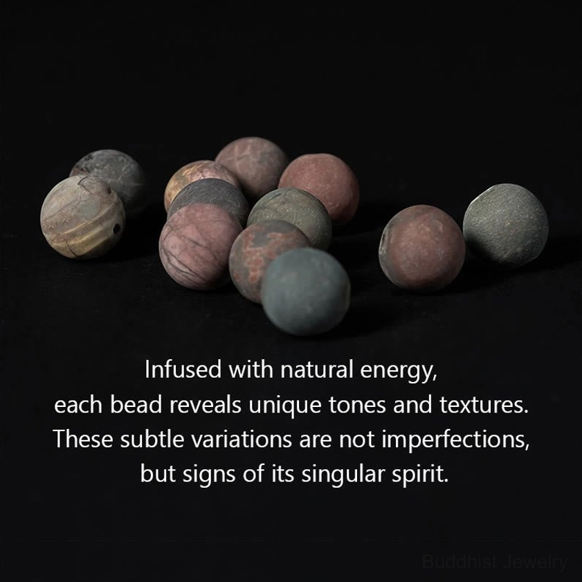 Loose natural Picasso Jasper round stone beads 8mm showing unique variegation patterns on black background