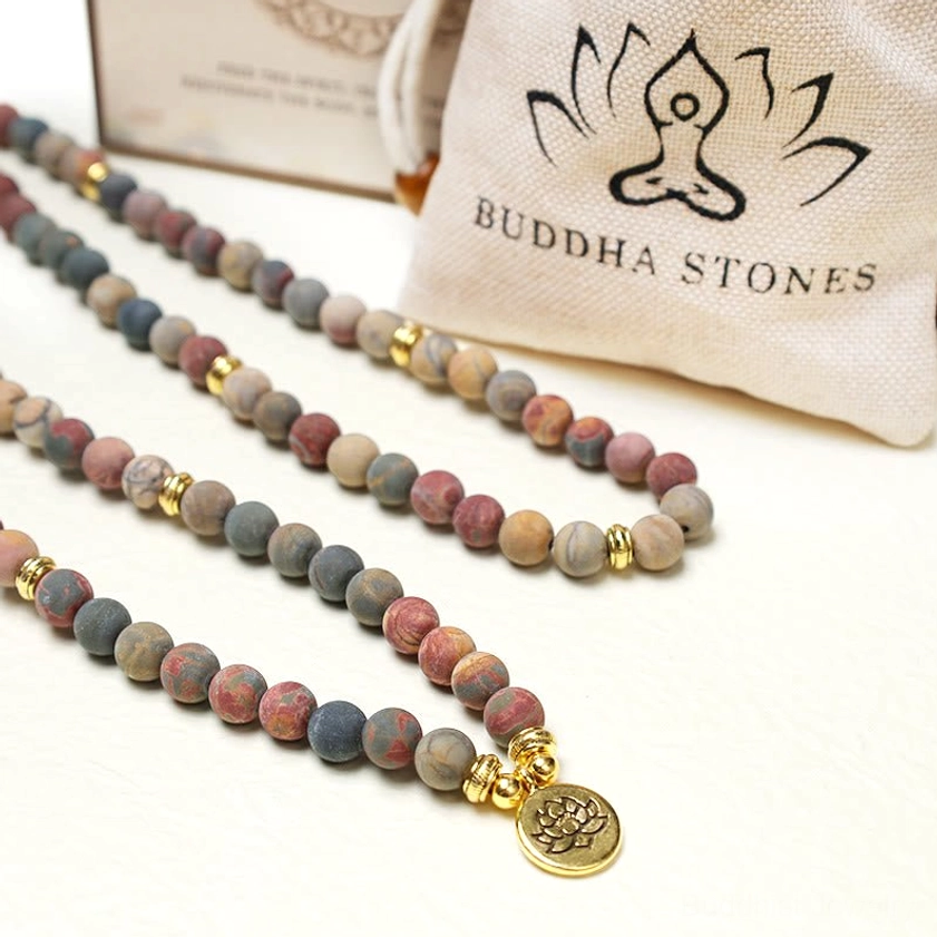 Picasso Jasper mala bracelet worn on wrist wrapped multiple times showing natural stone patina
