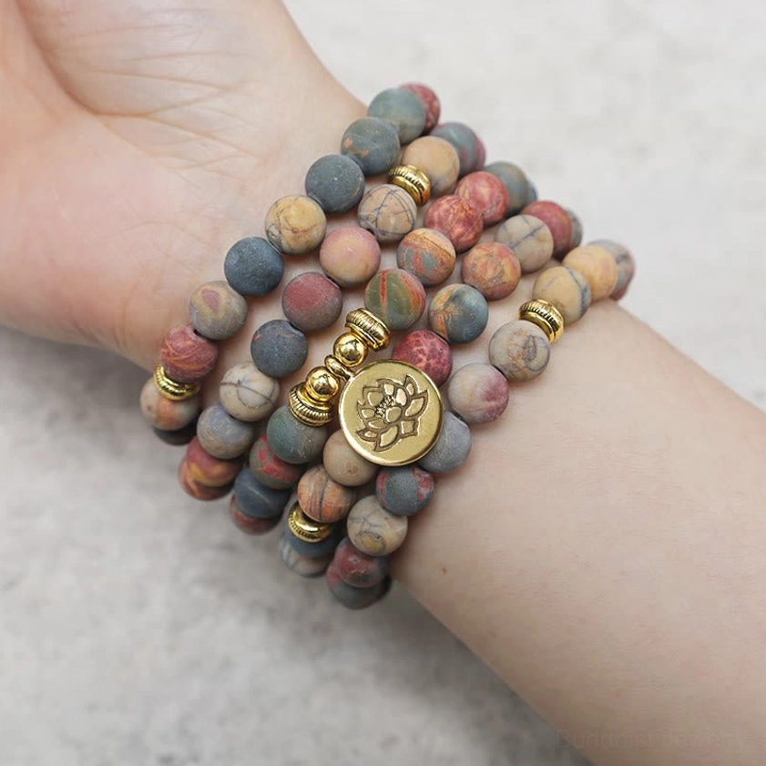 Multiple Picasso Jasper 108 mala beads bracelets with gold lotus charms and Buddha Stones storage pouch