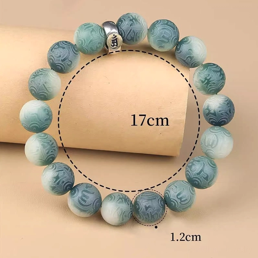 Pig zodiac natal Buddha bracelet with Amitabha Buddha charm representing compassion