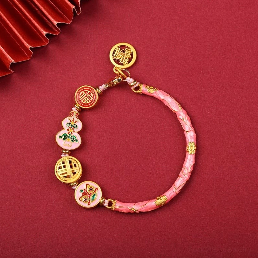 Pink enamel copper lion gourd prosperity bracelet with gold metal charm accents for wealth and happiness