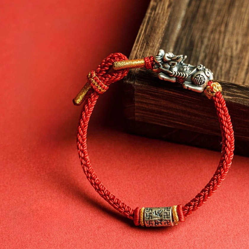 Sterling silver Pixiu red string bracelet rear side with engraved end bead and gold cord accents