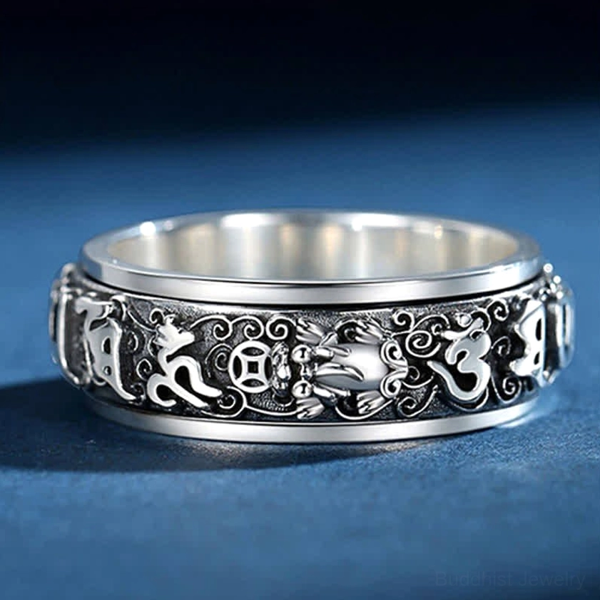 Sacred Buddhist rotatable ring with intricate engraved Pixiu motifs and smooth inner ring surface, side profile showing spiritual craftsmanship