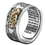 Pixiu Buddhist wealth ring side view featuring vintage silver band with gold-plated Pixiu sculpture and engraved sacred mantras on inner surface