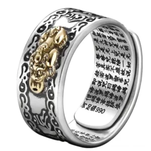 Pixiu Buddhist wealth ring side view featuring vintage silver band with gold-plated Pixiu sculpture and engraved sacred mantras on inner surface