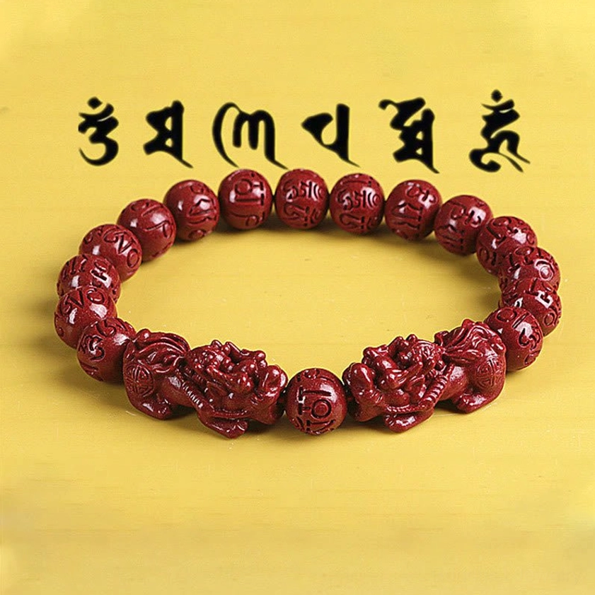 Cinnabar Pixiu beaded bracelet with Sanskrit text background and paired charms