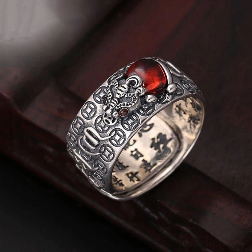 Single Pixiu fortune ring with embossed coin and scripture motifs, retro silver patina, 3/4 angle side view