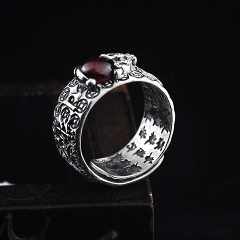 PiXiu Red Garnet Ring back view - displaying full carved band pattern with Buddhist motifs and protective talisman design