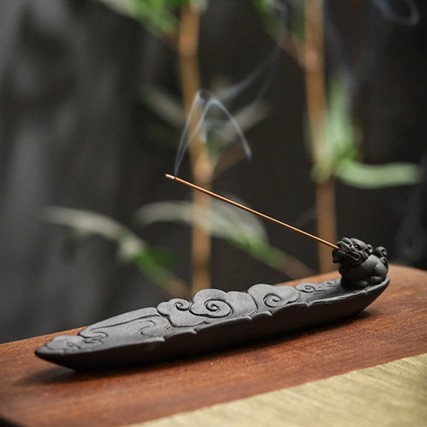 Handcrafted Pixiu ceramic incense holder for meditation and spiritual practice with black finish