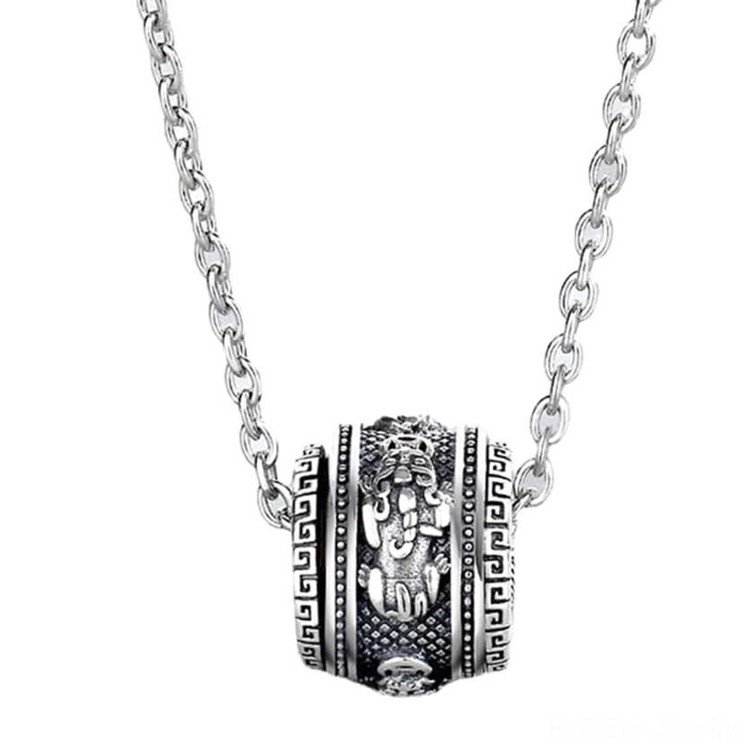 Flat front studio view of Pixiu lucky rotating necklace pendant highlighting prominent Buddhist Pixiu carving with twisted metal chain