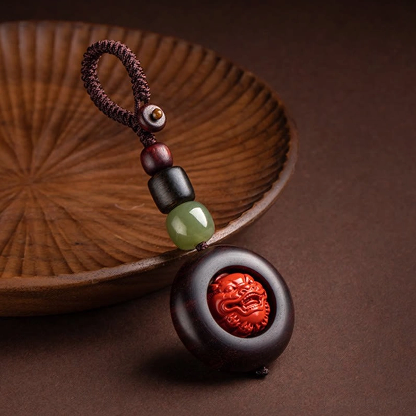 PiXiu wealth guardian keychain with mythical creature charm, red sandalwood beads, and cinnabar for prosperity and protection