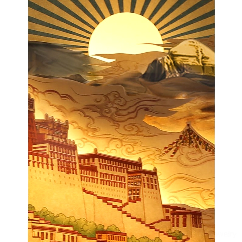 Detail shot of paper carving LED lamp showing glowing sun with radial light effect and layered mountain landscape