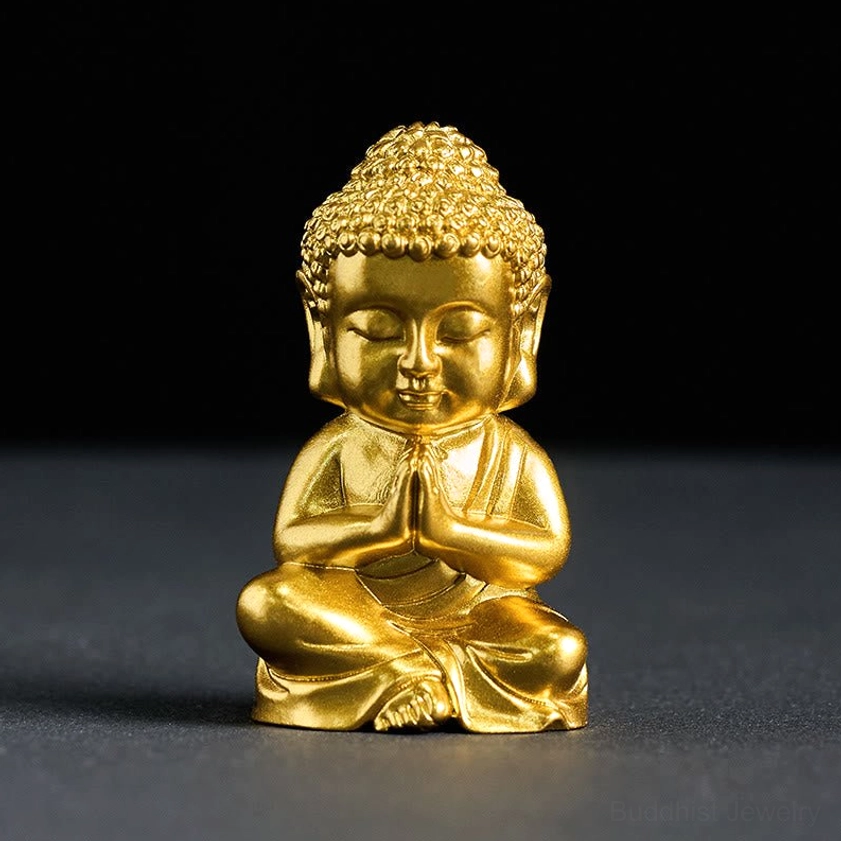 Prayer pose Buddha figurine fridge magnet front view with hands in prayer mudra and bright gold finish