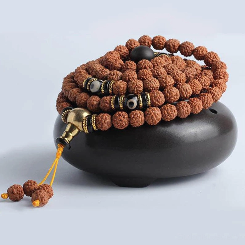 Handmade Mala Bracelet Coiled with Yellow Tassel Charm and Dzi Bead Accents