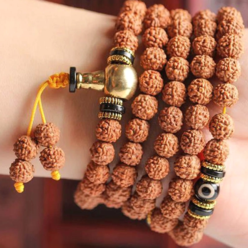 Handmade Rudraksha Mala Prayer Bracelet on Wrist with Gold Metal and Dzi Details