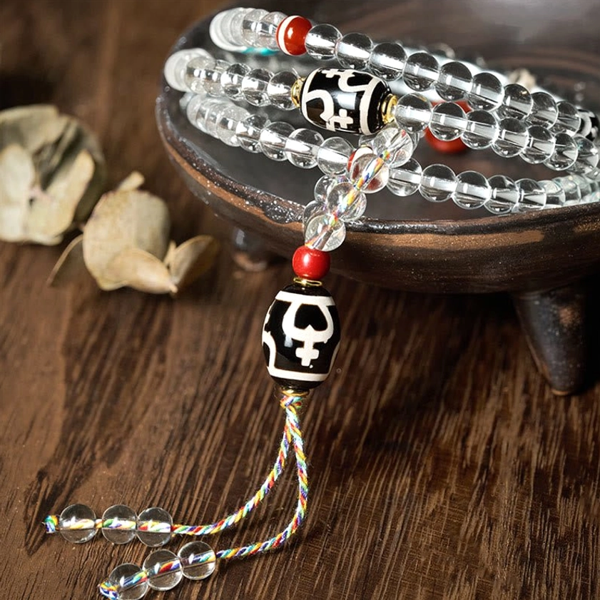 Buddhist mala bracelet with rainbow braided tassel and protective dzi bead charm