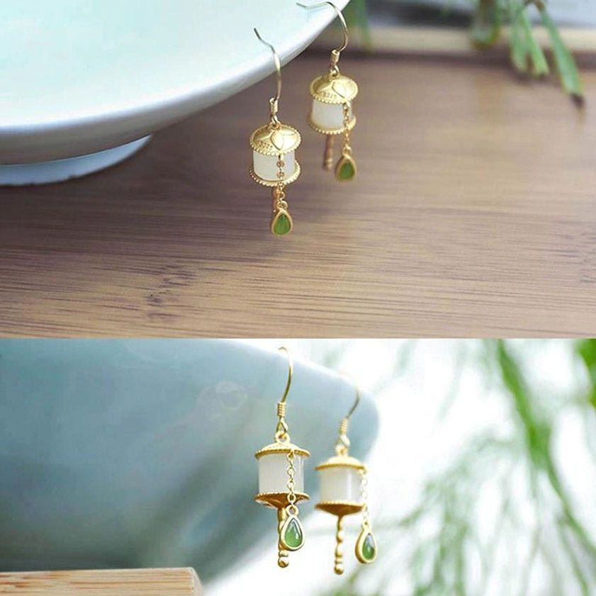 Jade prayer wheel Buddhist earrings size comparison showing 38mm drop length, natural stone variations and authentic jade coloring