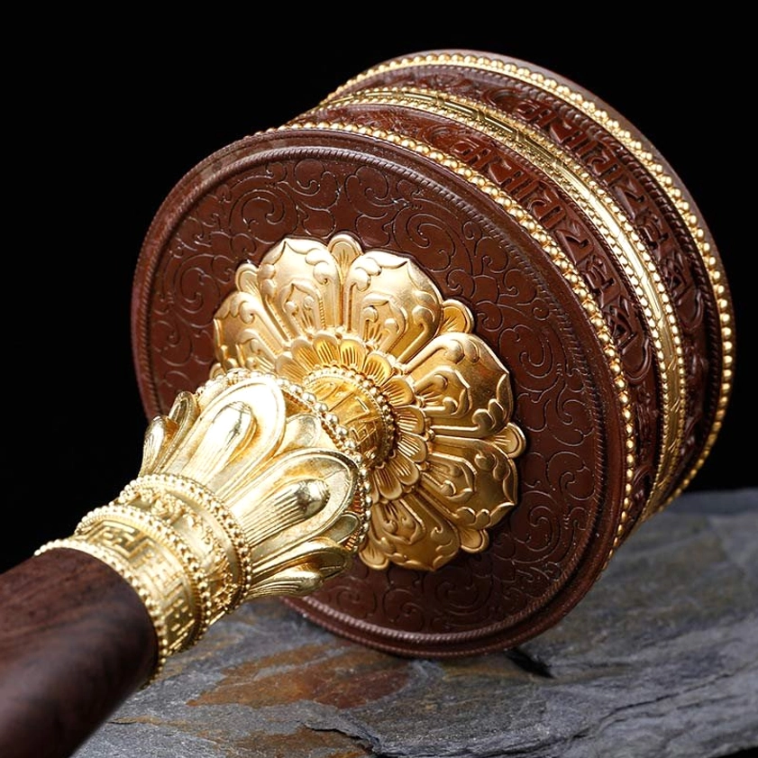 Buddhist prayer wheel demonstrating spiritual practice for meditation, mindfulness, and inner peace